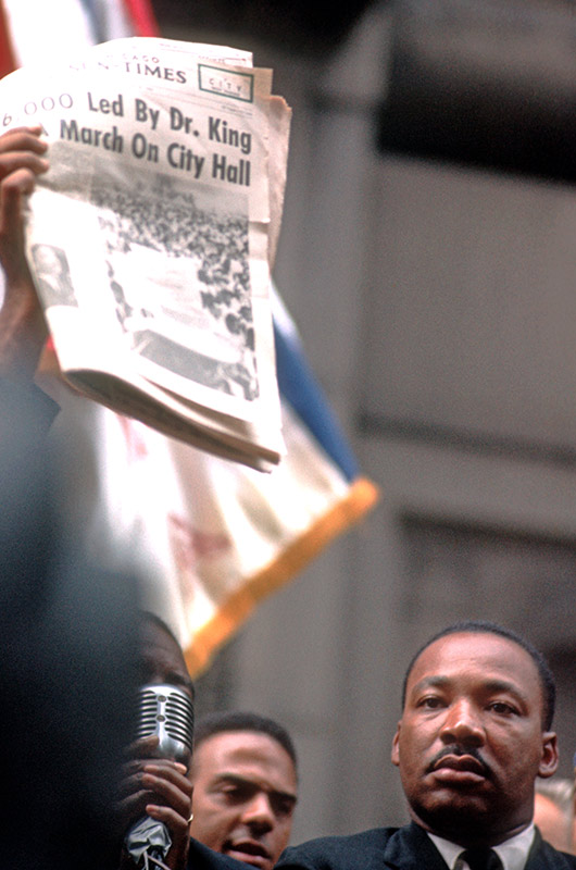 Martin Luther King Jr., With Newspaper, City Hall, Chicago, 1966