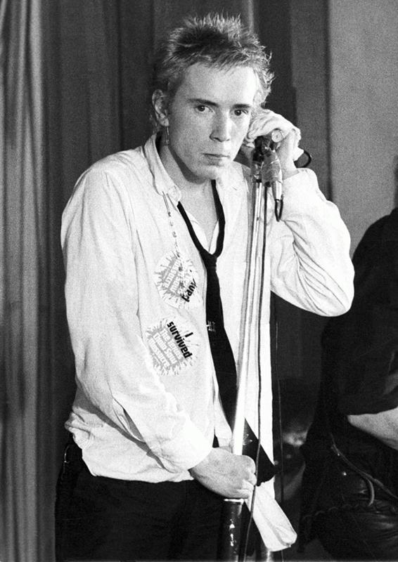 The Sex Pistols, Johnny Rotten on the Mic, Notre Dame Hall, London, 1976