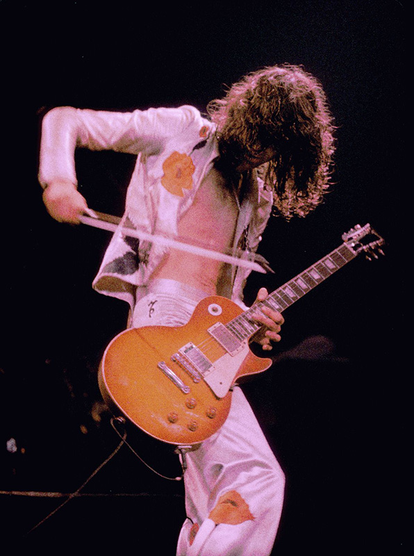 Jimmy Page with Violin Bow, Madison Square Garden, NYC, 1977