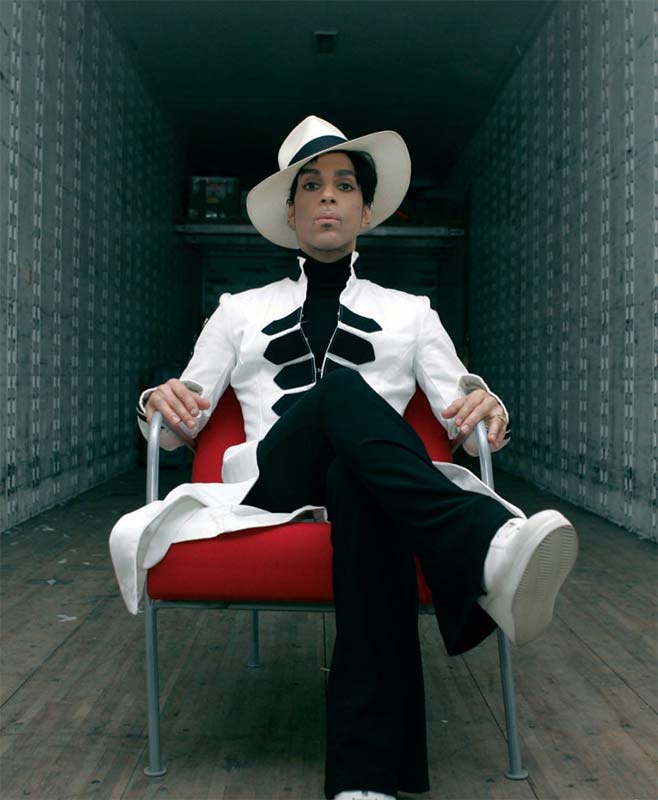 Prince Portrait in White Suit Seated in Trailer, 2004