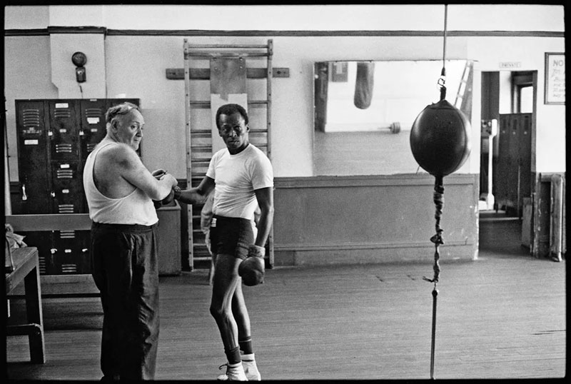Miles Davis With a Trainer at Gleason's Gym, NYC, 1970