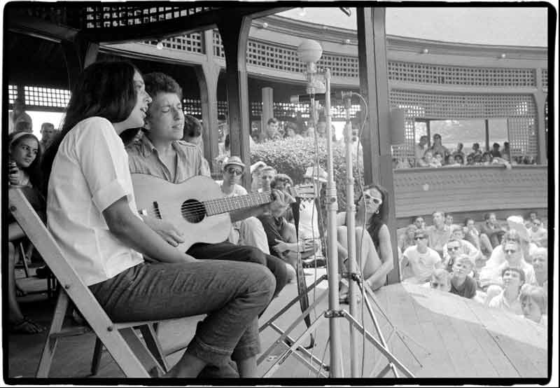 Joan Baez and Bob Dylan Singing (seated landscape), Newport Folk Festival, 1963
