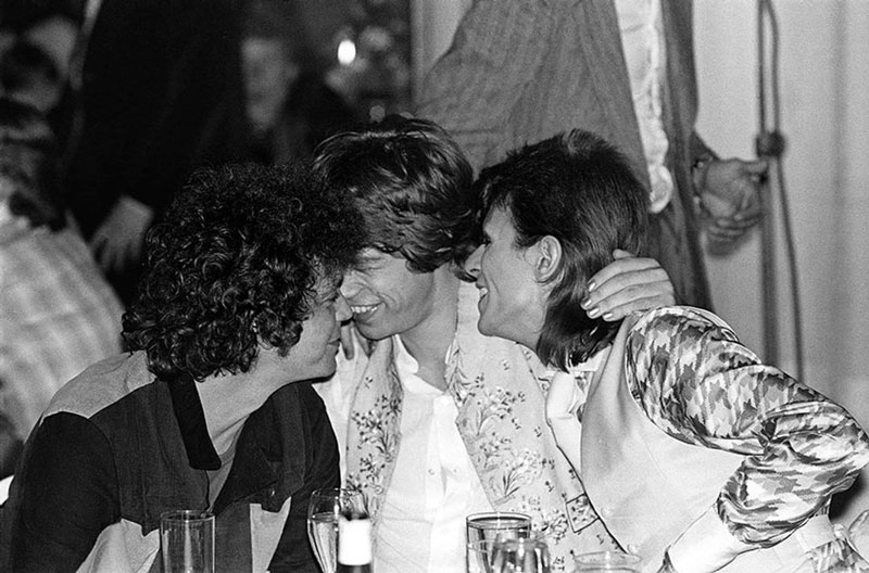 David Bowie, Lou Reed, & Mick Jagger "Cuddling",  Cafe Royal, London, July, 1973