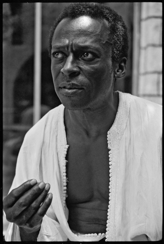Miles Davis Outside his Home in White Kaftan, Upper West Side, NYC, 1970 (I)