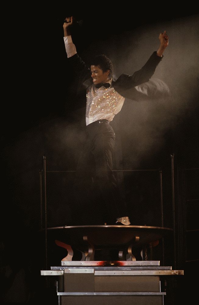 Michael Jackson Onstage, Arms Raised, 1981