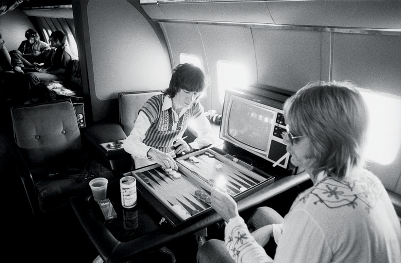 Bill Wyman Playing Backgammon, Stones Airplane, 1975