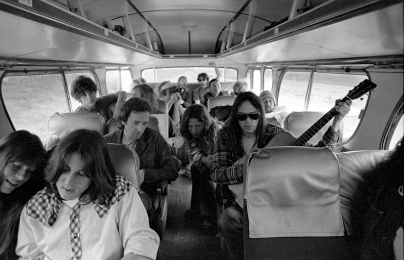 Neil Young, Cameron Crowe & The Eagles on a Tour Bus, CA, 1974