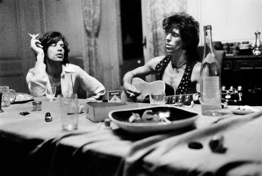 Mick Jagger & Keith Richards at the Dining Table II, Nellcôte, France, 1971