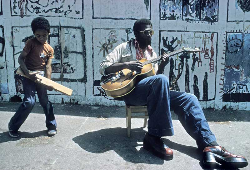 Taj Mahal, Playing Guitar in the Street, Berkeley, CA, 1974