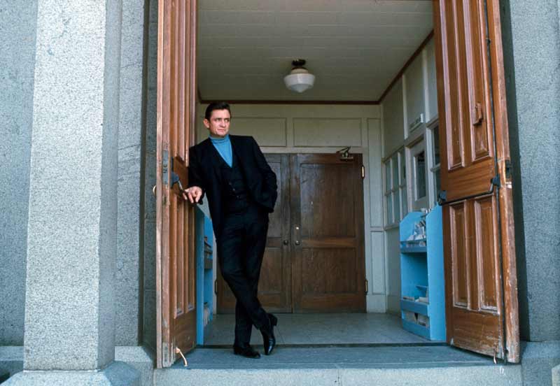 Johnny Cash Outside Greystone Chapel in Doorway - [Color], Folsom, CA 1968