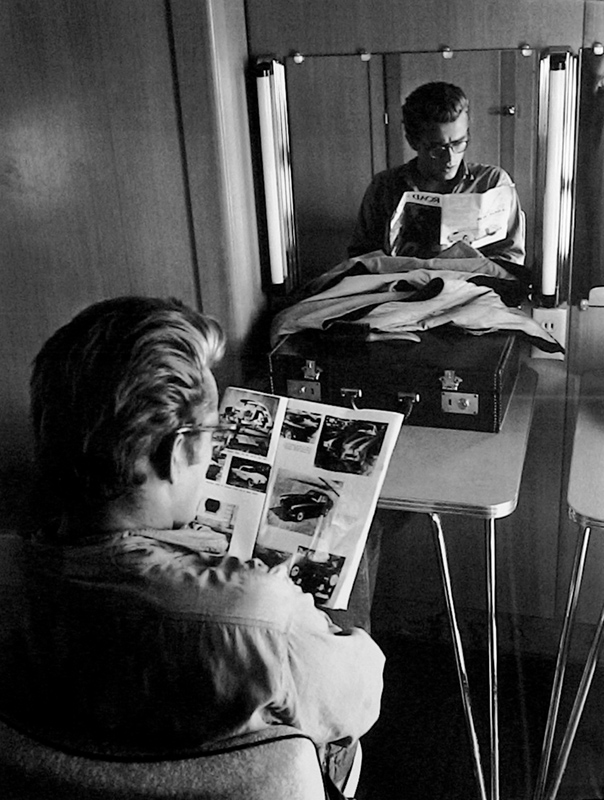 James Dean Reading a Car Magazine While Making Giant, Marfa, TX, 1955