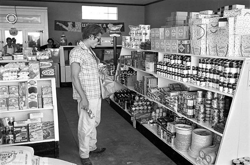 James Dean in a Local Grocery Store, While Making Giant, Marfa, TX, 1955