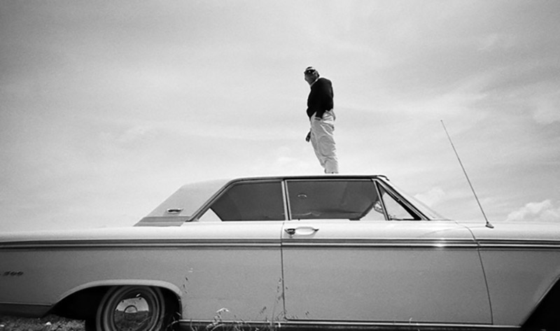 Steve McQueen Standing on the Roof of a Ford Galaxie 500, Cotati, CA, 1962