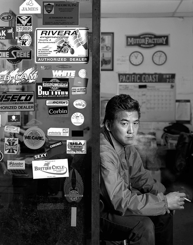 Chica in his Shop, Huntington Beach, CA, 2003